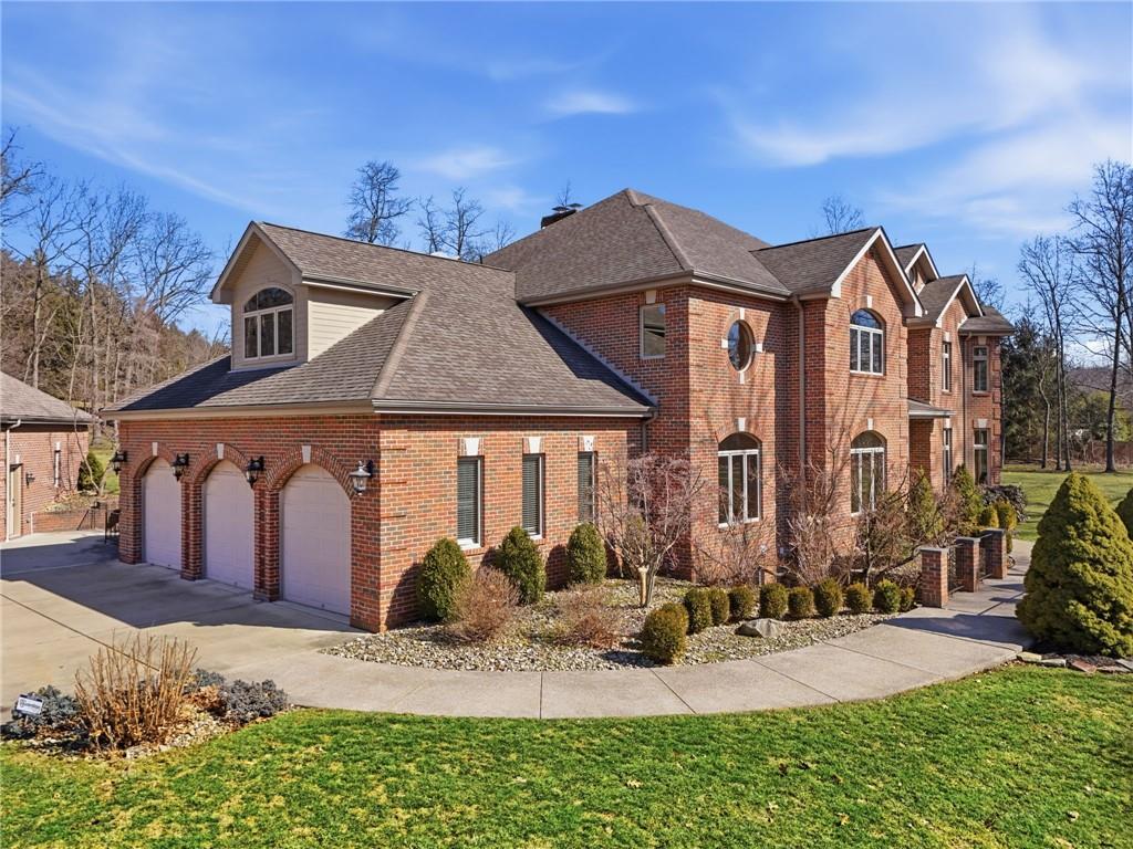 1653 Chapel Ridge Mars, PA 16046 - Photo 50 of 50 a front view of a house with garden
