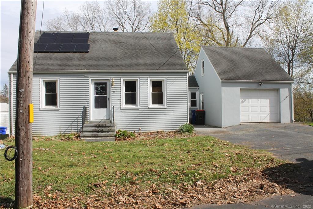 Front exterior/breezeway/one car garage