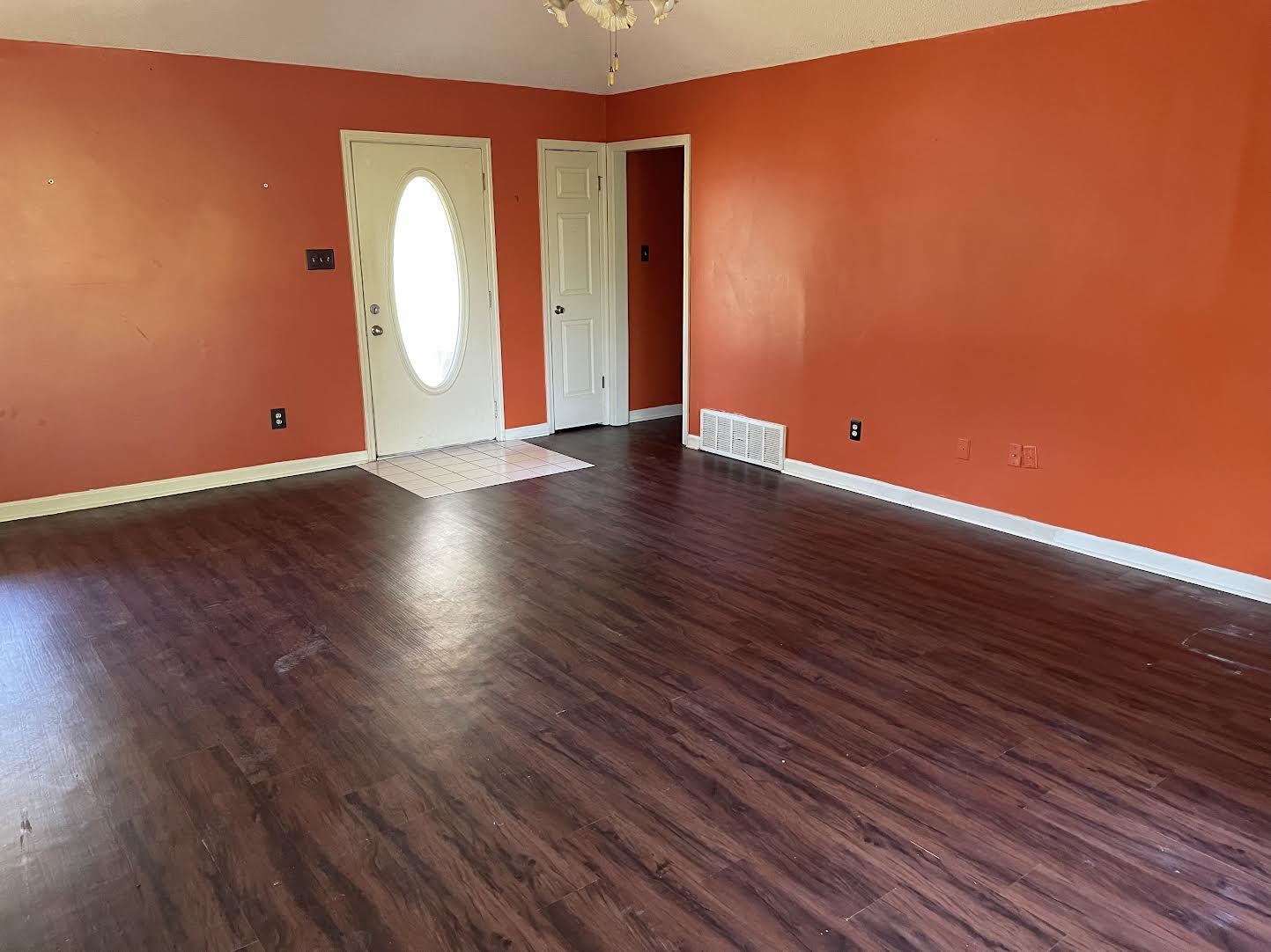 4713 Greenside Road Millington, TN 38053 - Photo 3 of 9 Entrance foyer with dark hardwood / wood-style flooring