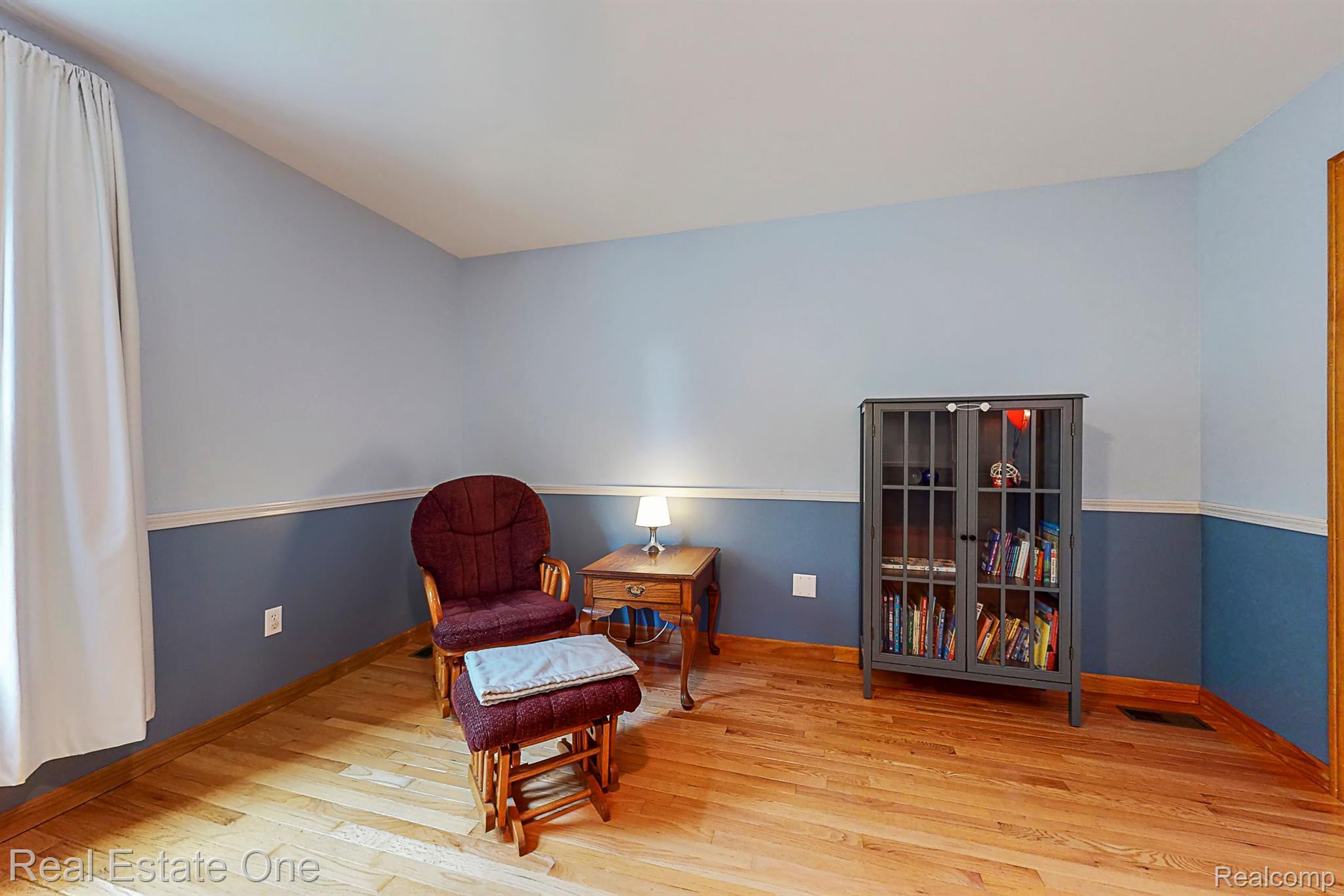 7448 Sharp Road Swartz Creek, MI 48473 - Photo 33 of 49 BDRM 3 large enough for sitting area. Oak Floors.