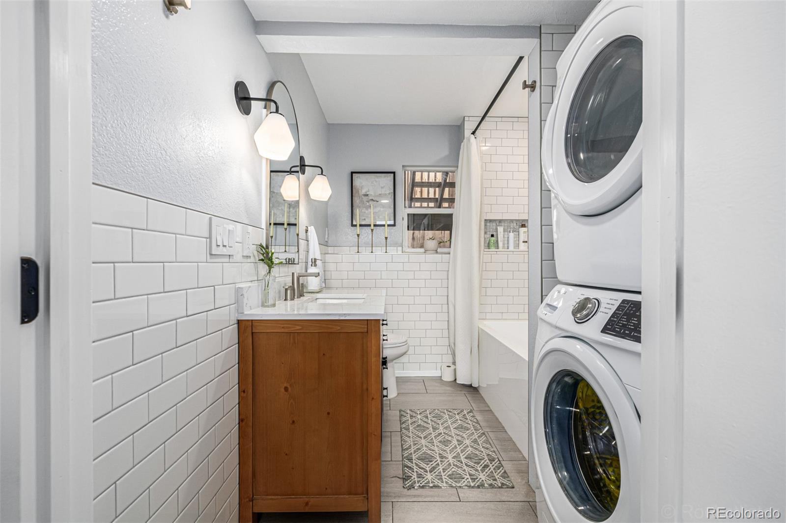 965 Wolff Street, Unit D Denver, CO 80204 - Photo 12 of 29 a utility room with dryer and washer