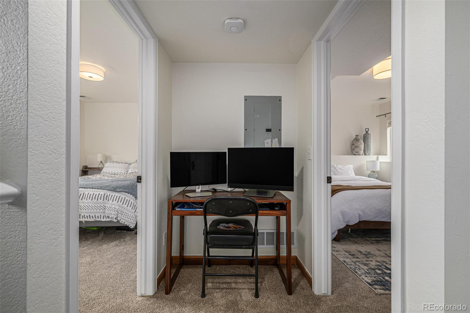 965 Wolff Street, Unit D Denver, CO 80204 - Photo 14 of 29 a bedroom with bed and a window