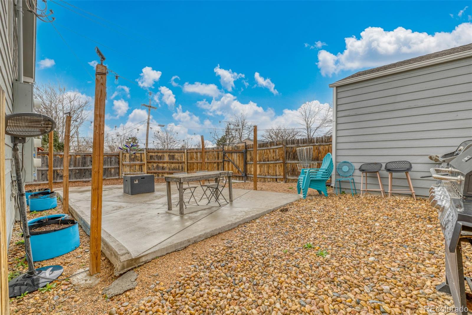 965 Wolff Street, Unit D Denver, CO 80204 - Photo 23 of 29 a view of a swimming pool with outdoor seating