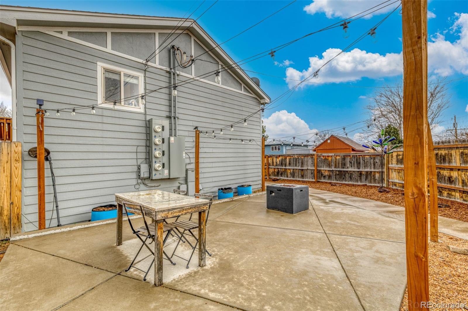 965 Wolff Street, Unit D Denver, CO 80204 - Photo 24 of 29 a balcony with table and chairs