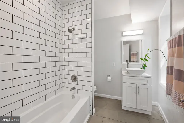 a bathroom with a bathtub