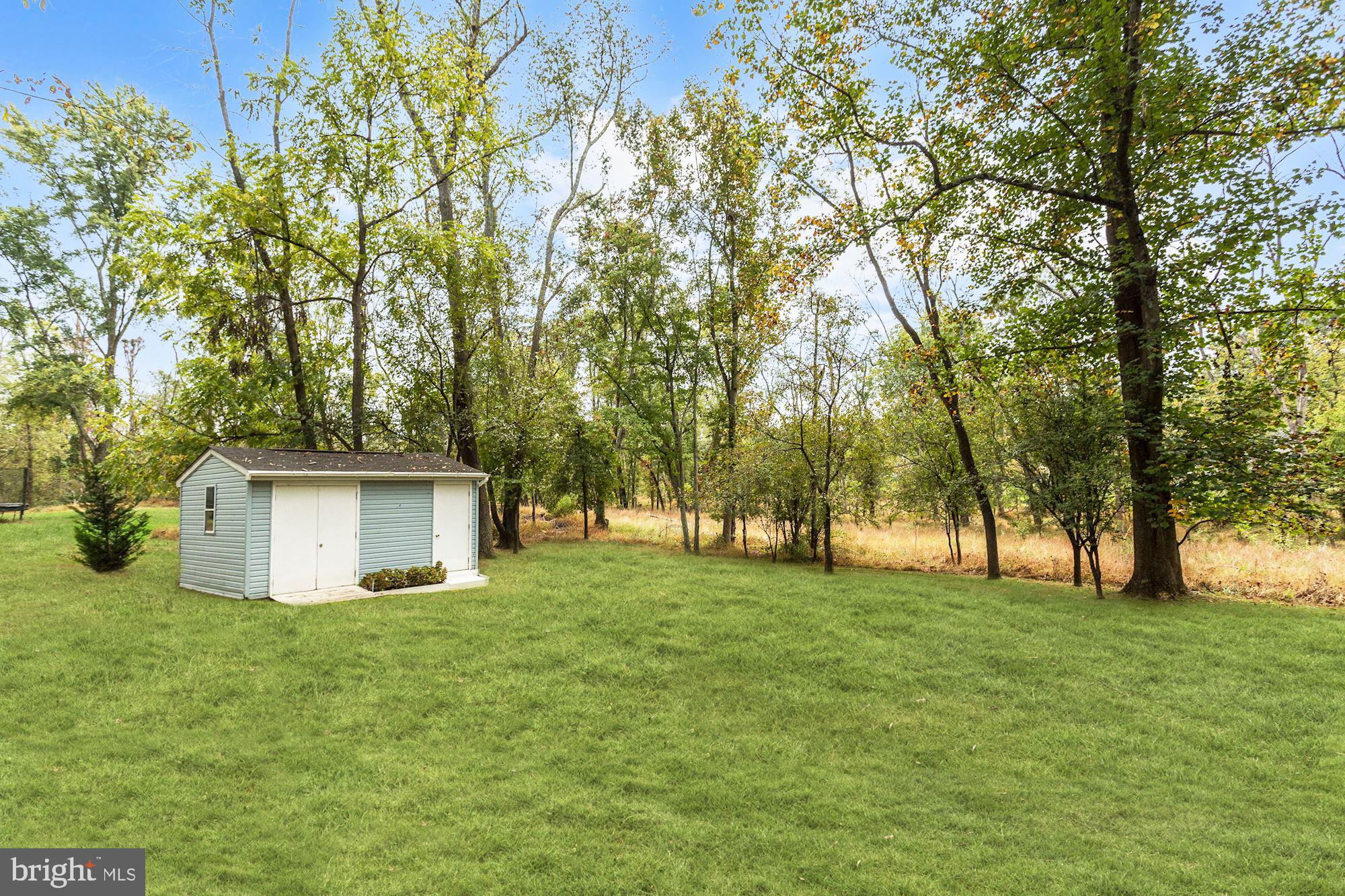 9749 Hillsmere Road Ellicott City, MD 21042 - Photo 34 of 39 Level Backyard & Secure Storage