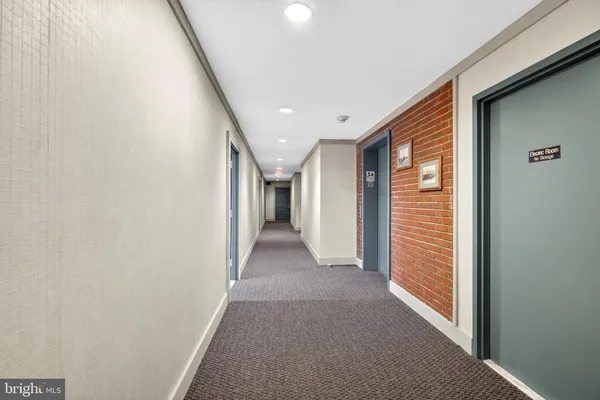 a view of a hallway with closet