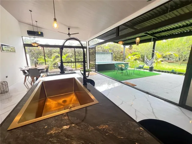 a view of a swimming pool with a porch