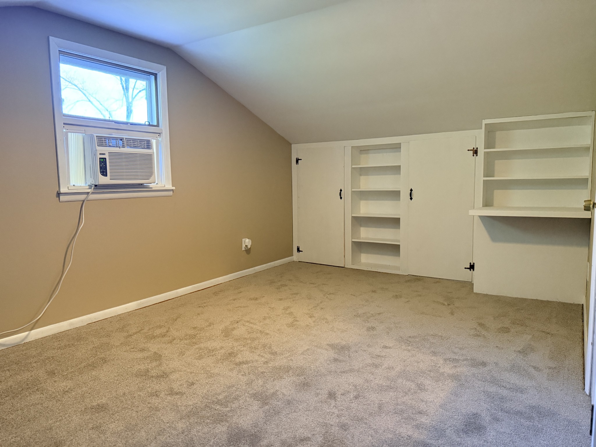902 Sycamore Drive Manchester, TN 37355 - Photo 22 of 56 a view of an empty room with a window