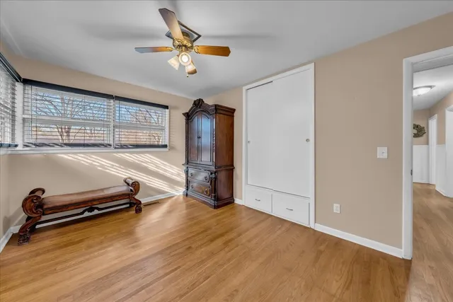 a room with gym equipment and a large window