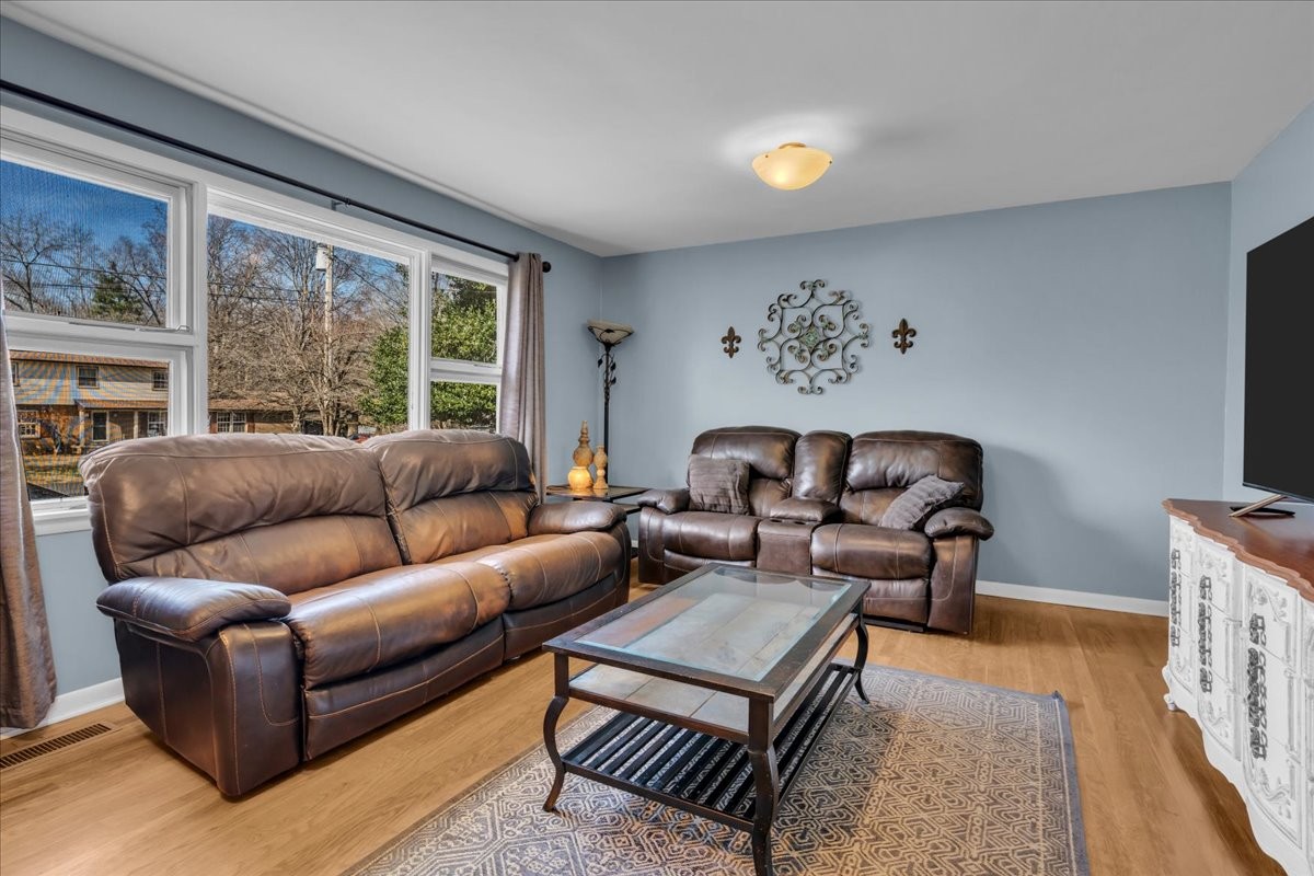902 Sycamore Drive Manchester, TN 37355 - Photo 7 of 51 a living room with furniture and a flat screen tv