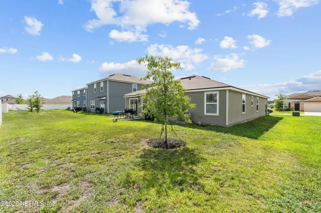 a house view with garden space