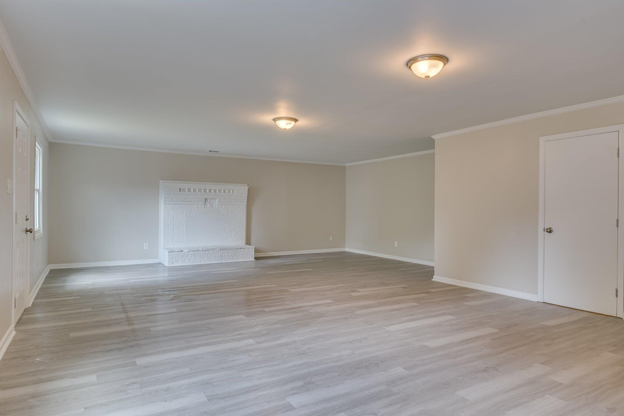 2115 Ashley Drive Augusta, GA 30906 - Photo 17 of 38 a view of an empty room with wooden floor and closet