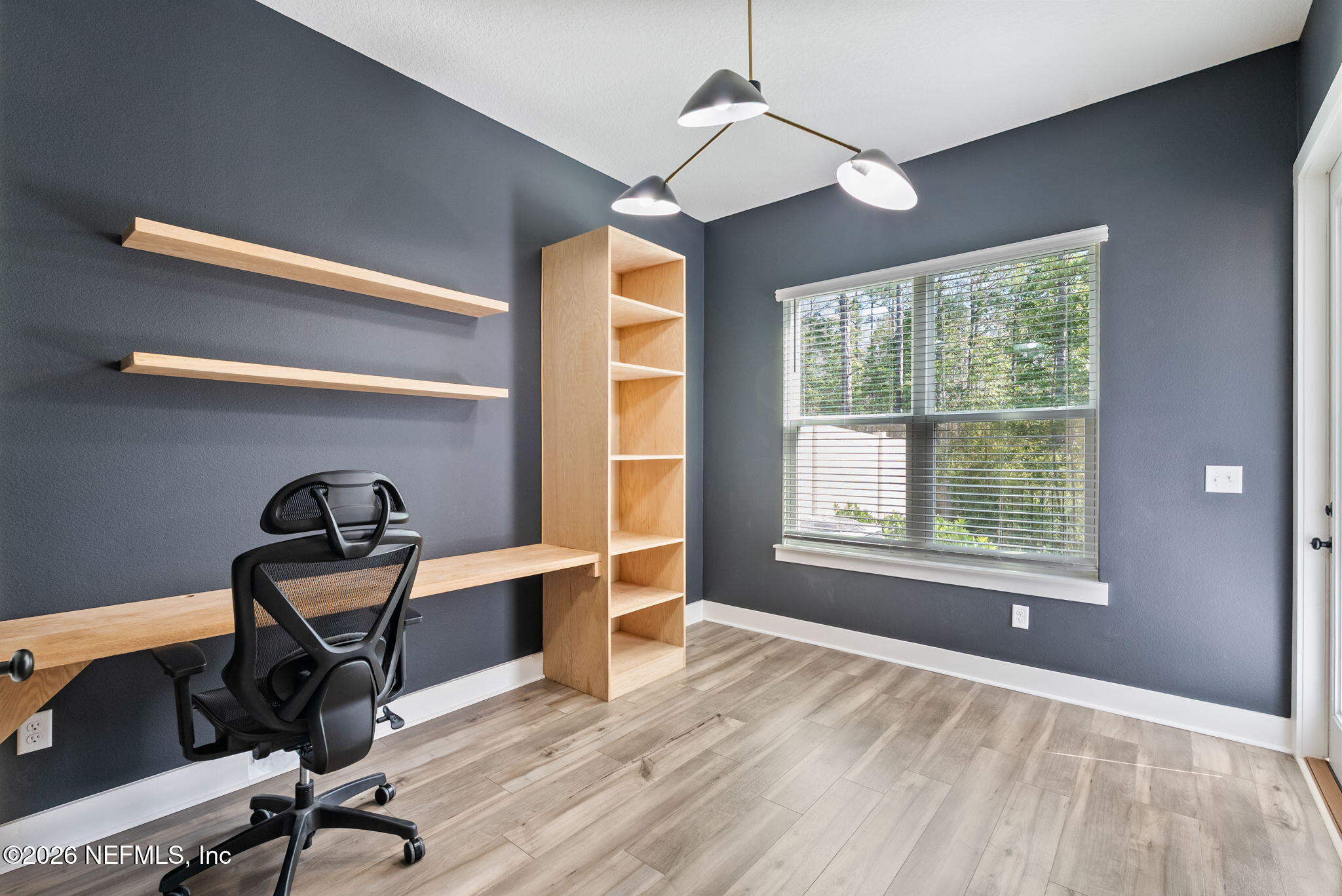 9989 Element Road Jacksonville, FL 32256 - Photo 17 of 58 a view of workspace with windows