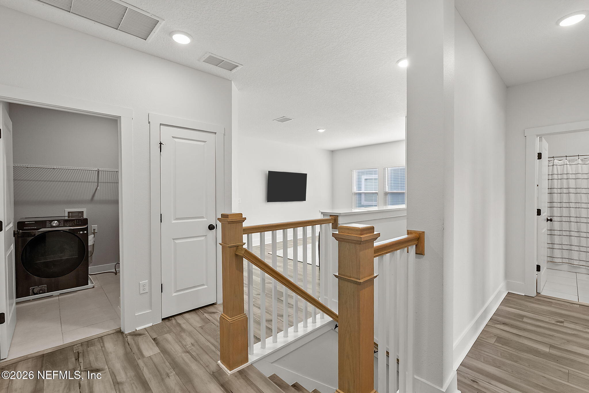 9989 Element Road Jacksonville, FL 32256 - Photo 19 of 58 a view of a hallway with seating area