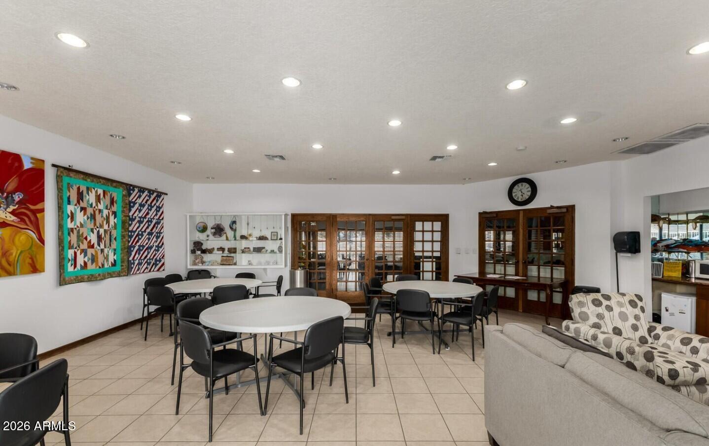 111 South Greenfield Road, Unit 90 Mesa, AZ 85206 - Photo 13 of 26 a view of a dining room with furniture and window