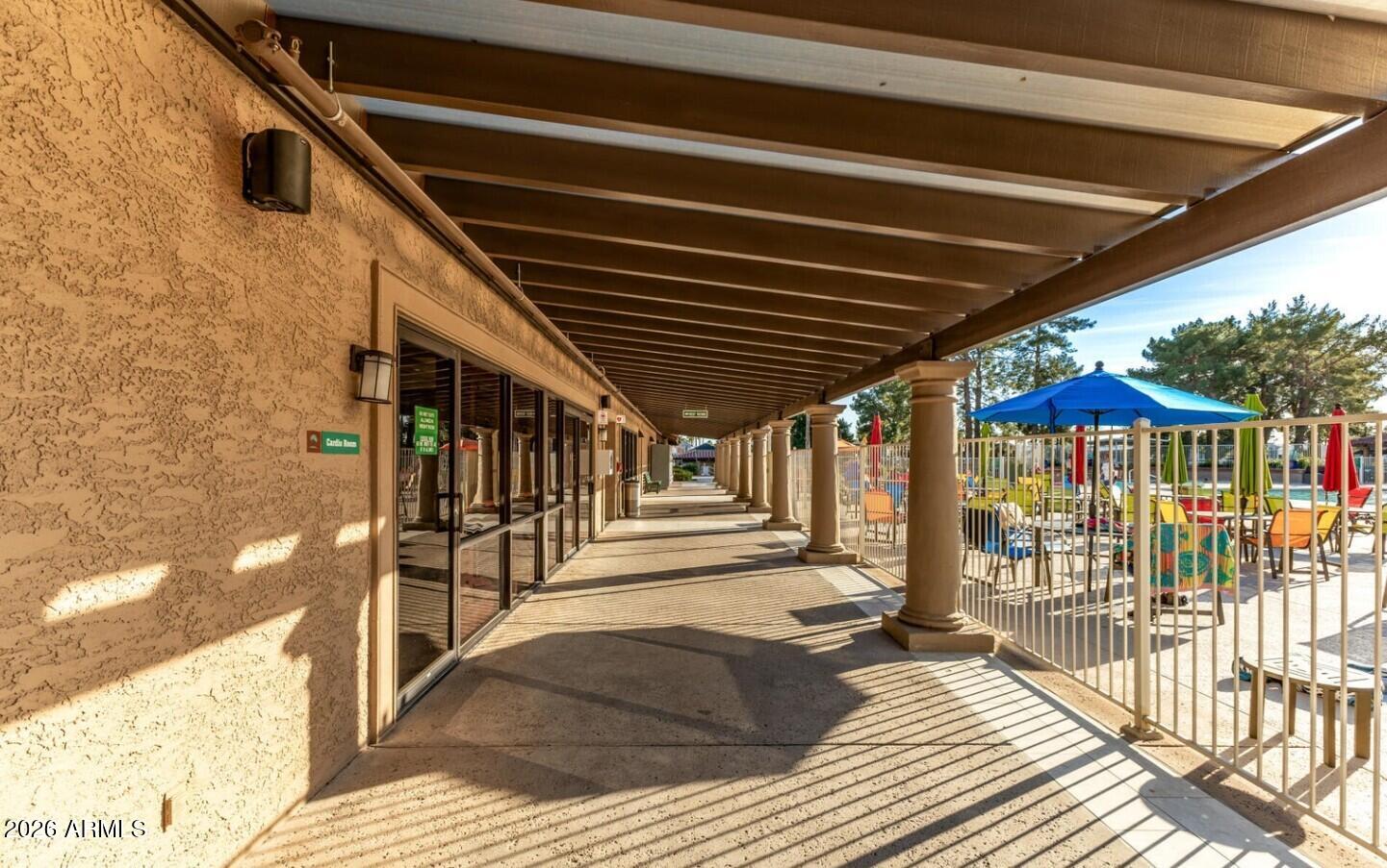111 South Greenfield Road, Unit 90 Mesa, AZ 85206 - Photo 15 of 26 a view of a patio with a table chairs