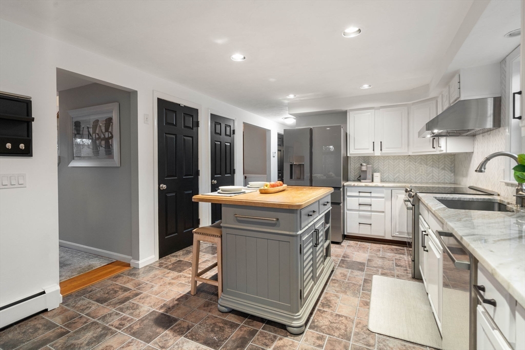 5 Cherry Brook Circle Sturbridge, MA 01566 - Photo 13 of 31 a kitchen with a sink stove and refrigerator