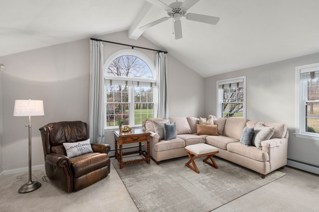 5 Cherry Brook Circle Sturbridge, MA 01566 - Photo 17 of 31 a living room with furniture and a large window