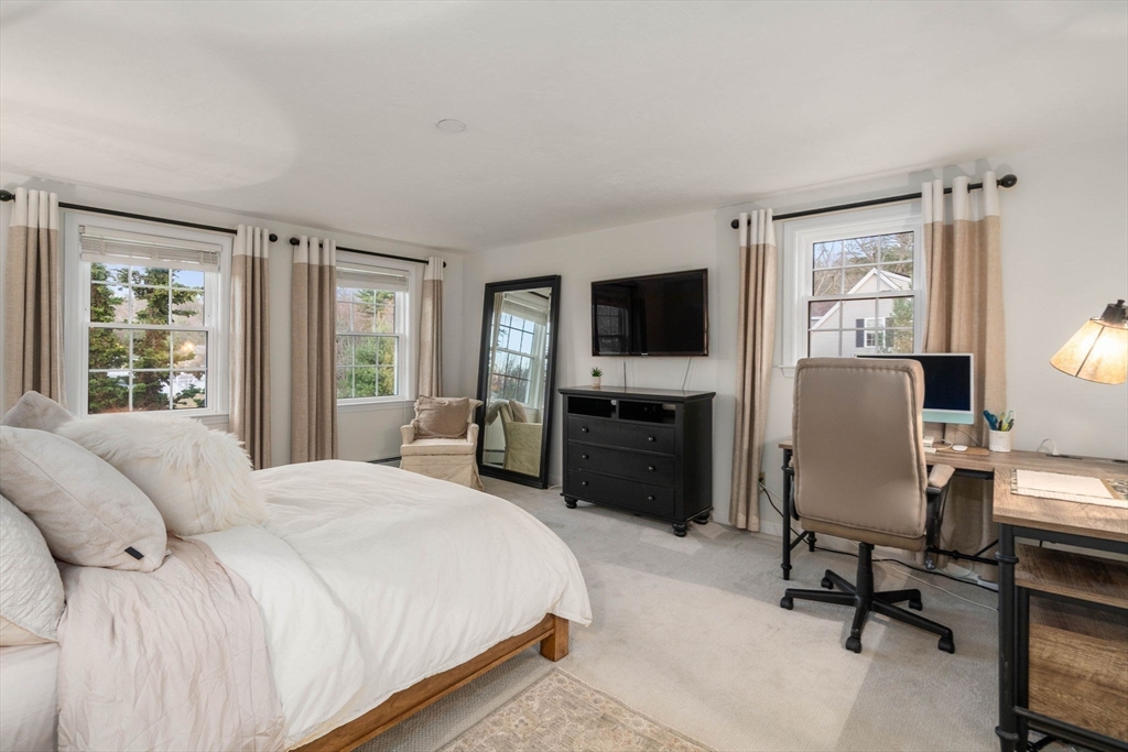 5 Cherry Brook Circle Sturbridge, MA 01566 - Photo 23 of 31 a bedroom with a bed television and a window