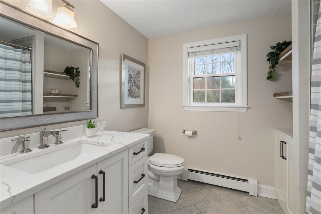 5 Cherry Brook Circle Sturbridge, MA 01566 - Photo 27 of 31 a bathroom with a sink toilet and shower