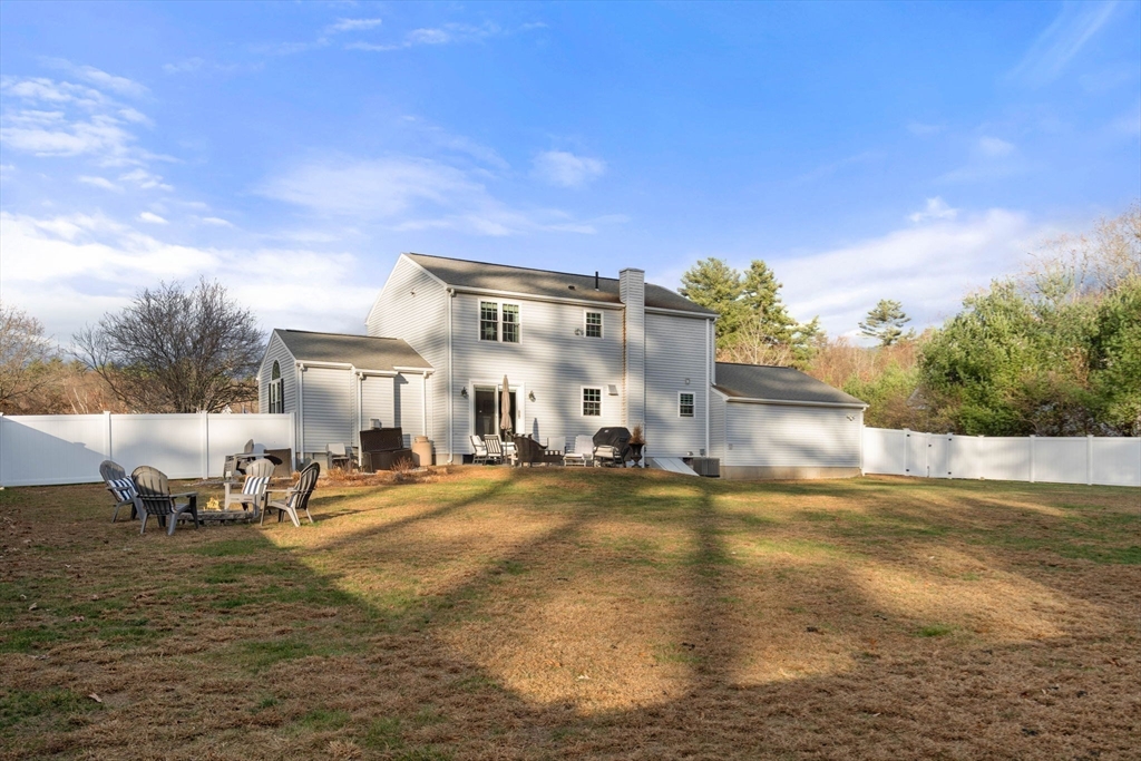 5 Cherry Brook Circle Sturbridge, MA 01566 - Photo 28 of 31 a view of a building with backyard