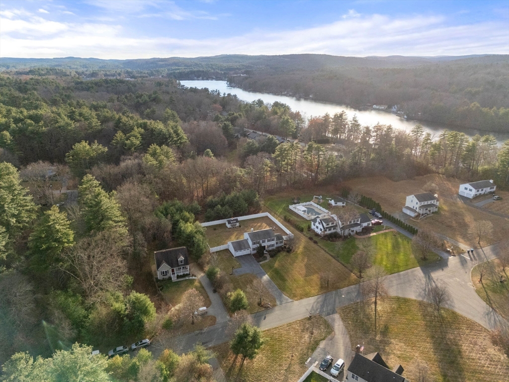 5 Cherry Brook Circle Sturbridge, MA 01566 - Photo 6 of 31 a view of a lake in middle of the town