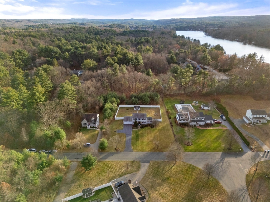 5 Cherry Brook Circle Sturbridge, MA 01566 - Photo 7 of 31 a view of a lake in middle of the town
