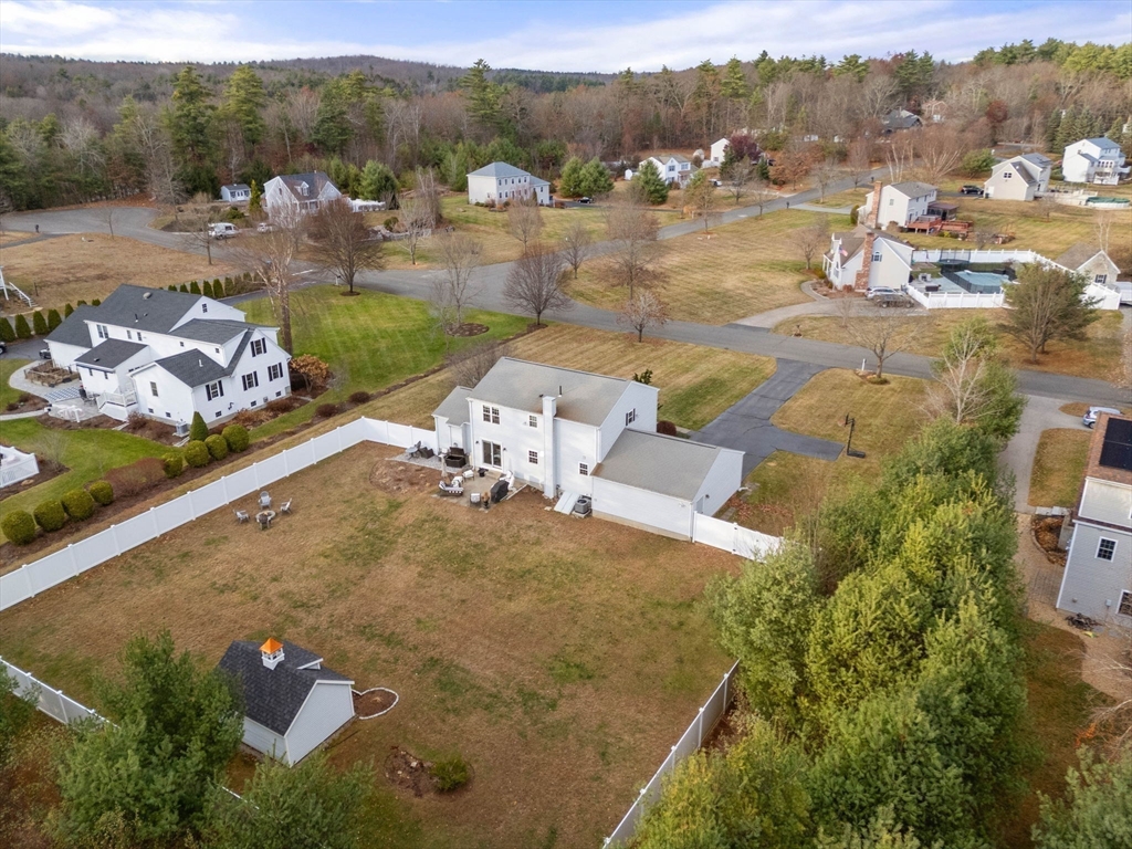 5 Cherry Brook Circle Sturbridge, MA 01566 - Photo 8 of 31 an aerial view of a house with a yard swimming pool outdoor seating and yard