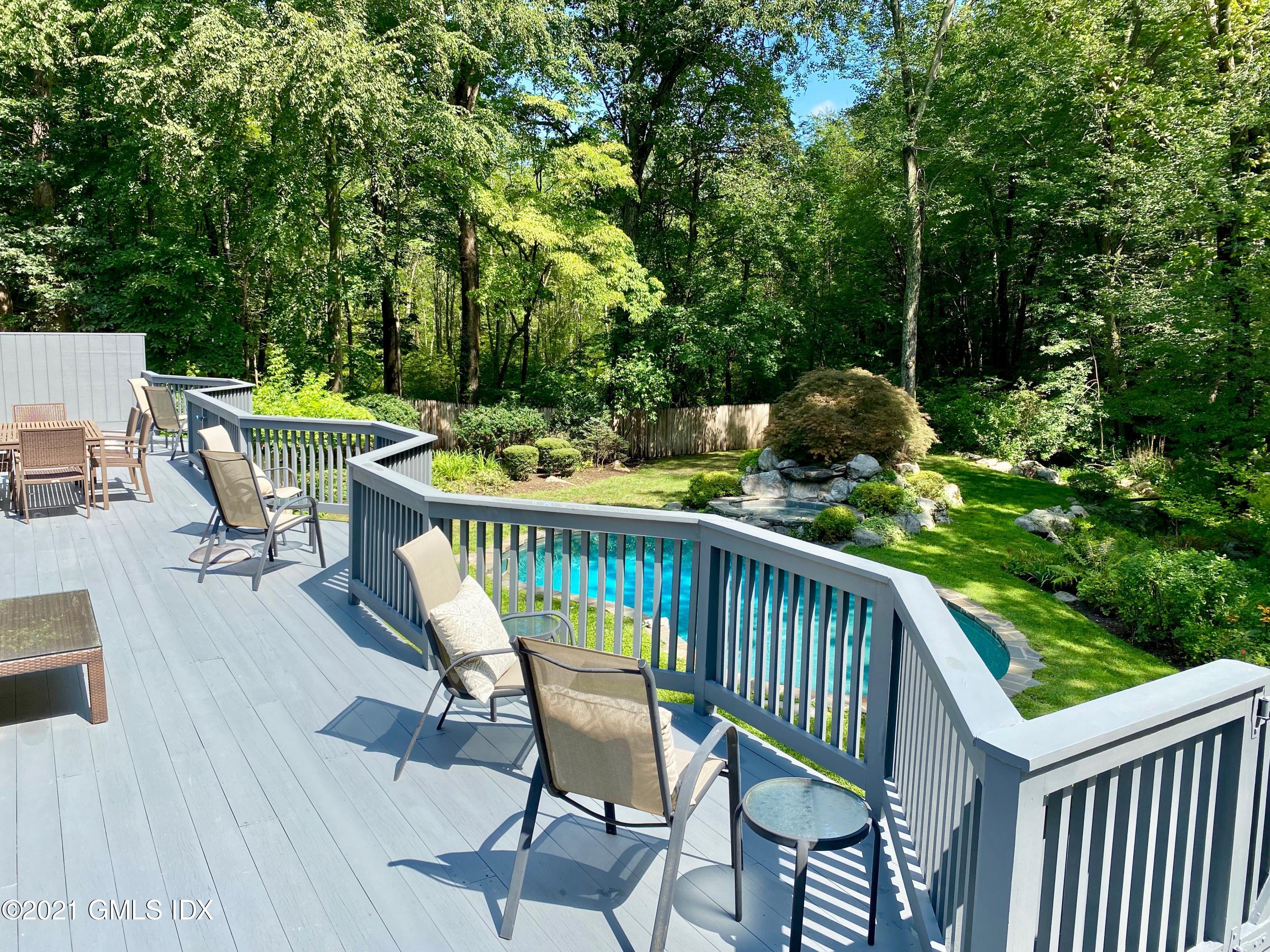 297 Cognewaugh Road Cos Cob, CT 06807 - Photo 18 of 25 a view of a chairs on the roof deck