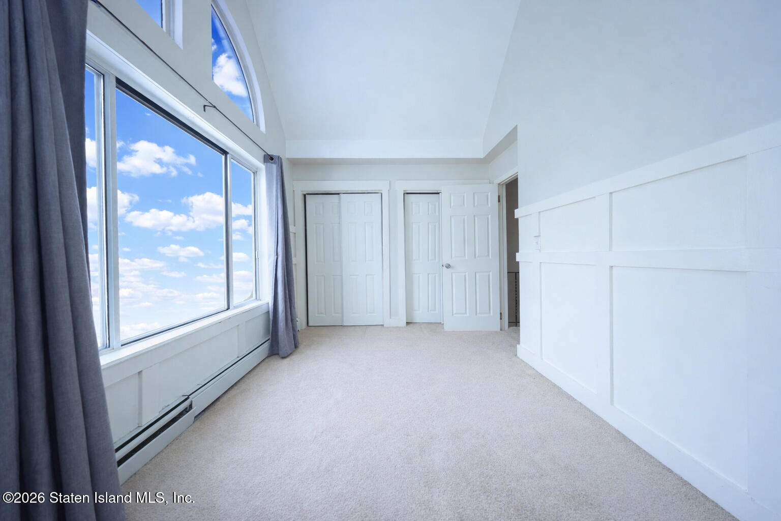 314 Harold Street Staten Island, NY 10314 - Photo 18 of 24 a view of empty room with window