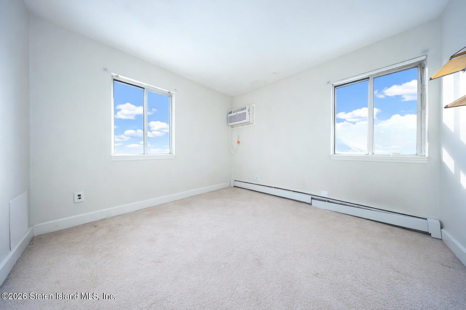 314 Harold Street Staten Island, NY 10314 - Photo 20 of 24 an empty room with windows