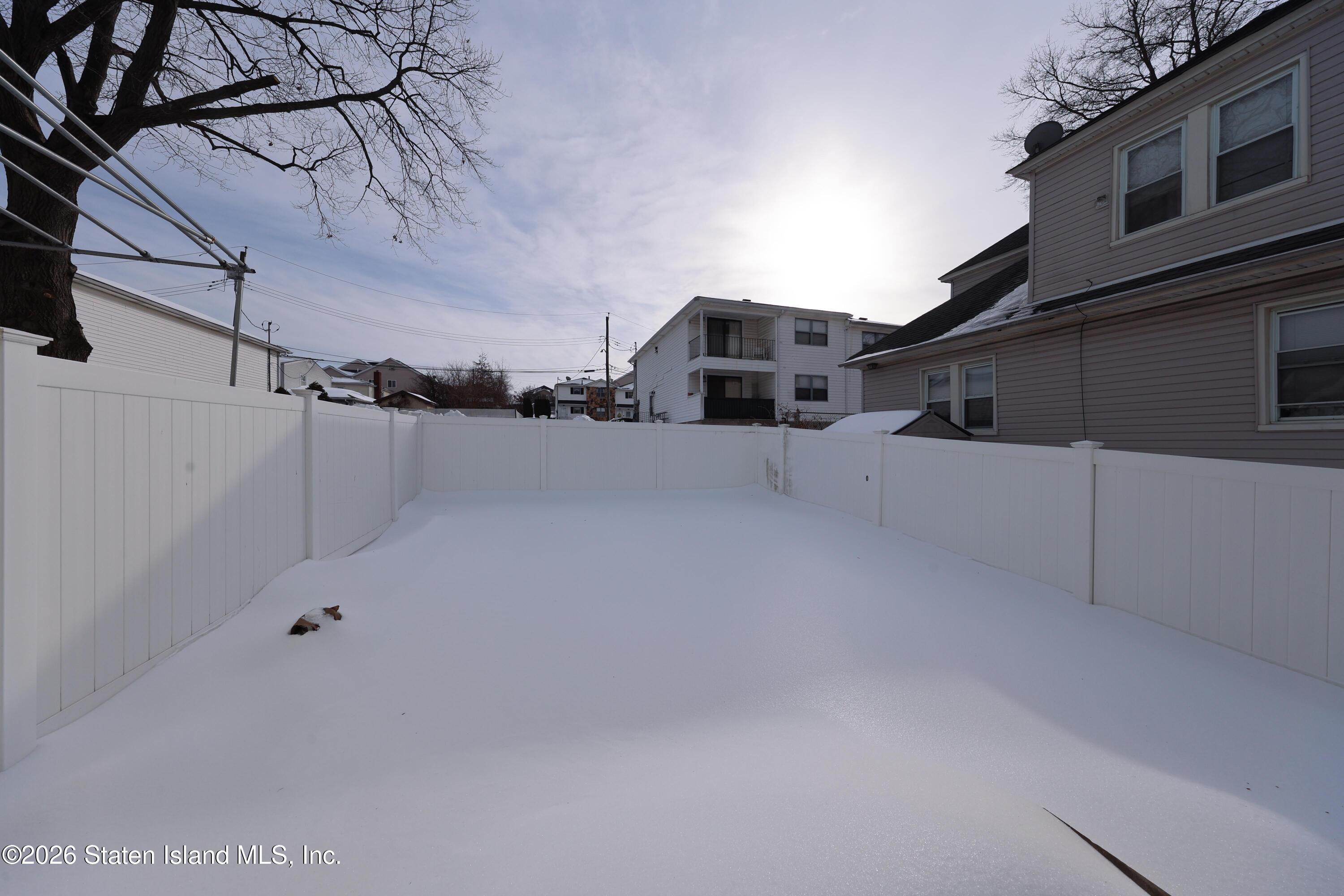 314 Harold Street Staten Island, NY 10314 - Photo 24 of 24 a view of a city street with tall buildings