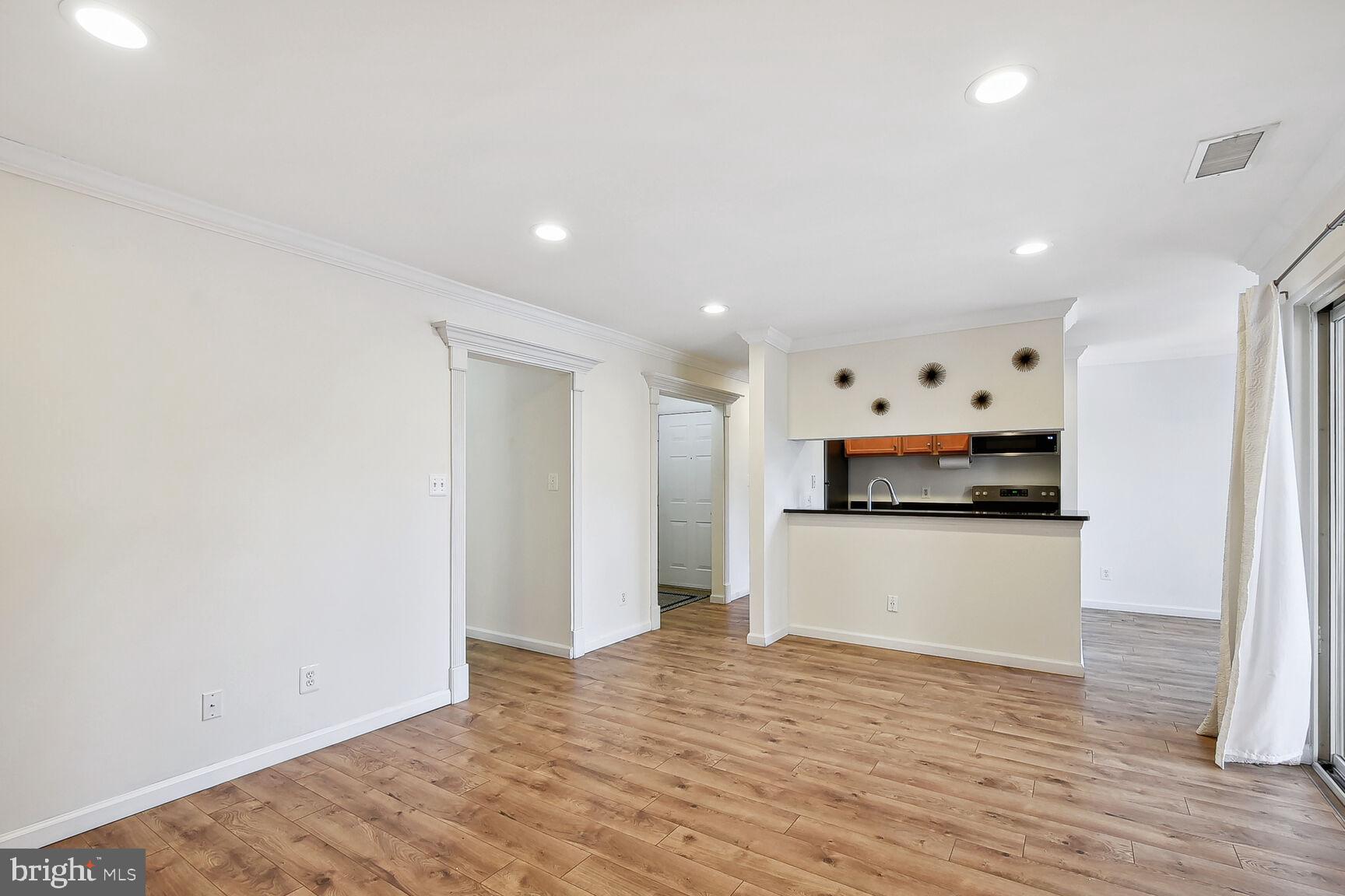 11715 Olde English Drive, Unit F Reston, VA 20190 - Photo 3 of 27 Durable LVT Plank Flooring