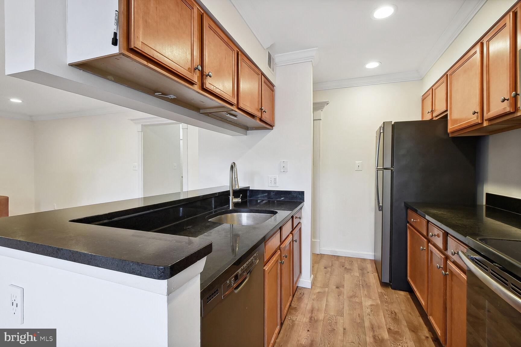 11715 Olde English Drive, Unit F Reston, VA 20190 - Photo 7 of 27 Black Stainless Appliances