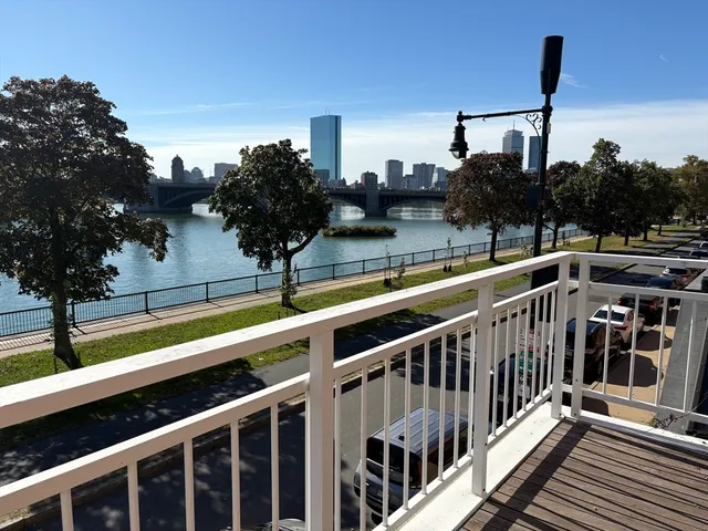 a view of a balcony with city view