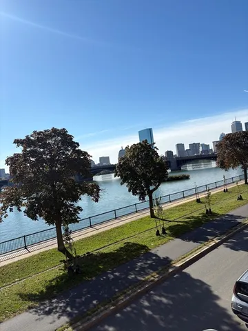 a view of a lake with a yard