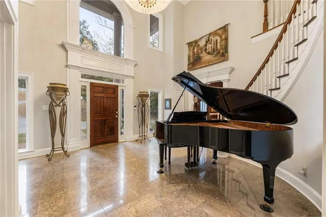 a kitchen with stainless steel appliances granite countertop a stove and a refrigerator
