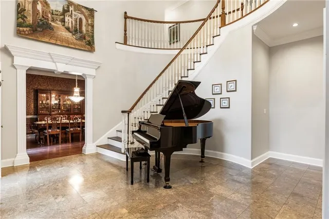 a living room with furniture or couch and a large window