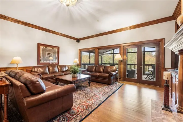 a bedroom with a bed and a television