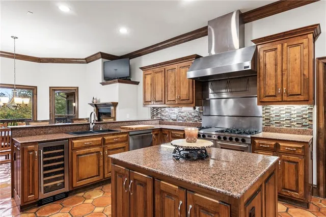 a room with pool table and windows
