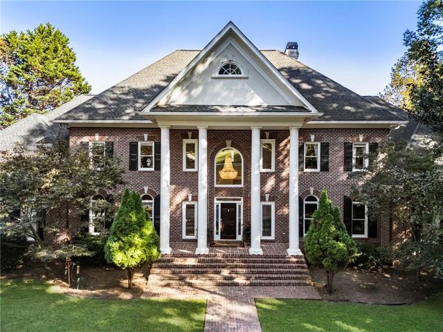a building with trees in front of it