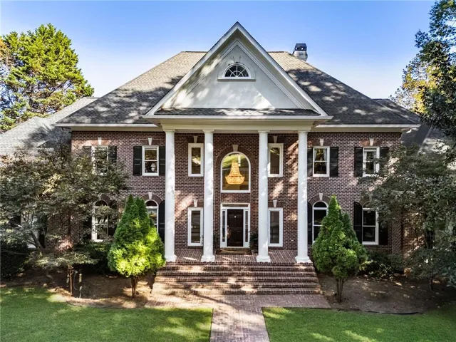 a building with trees in front of it