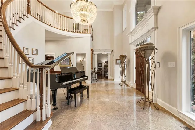 a kitchen with stainless steel appliances granite countertop a stove top oven a sink dishwasher and cabinets