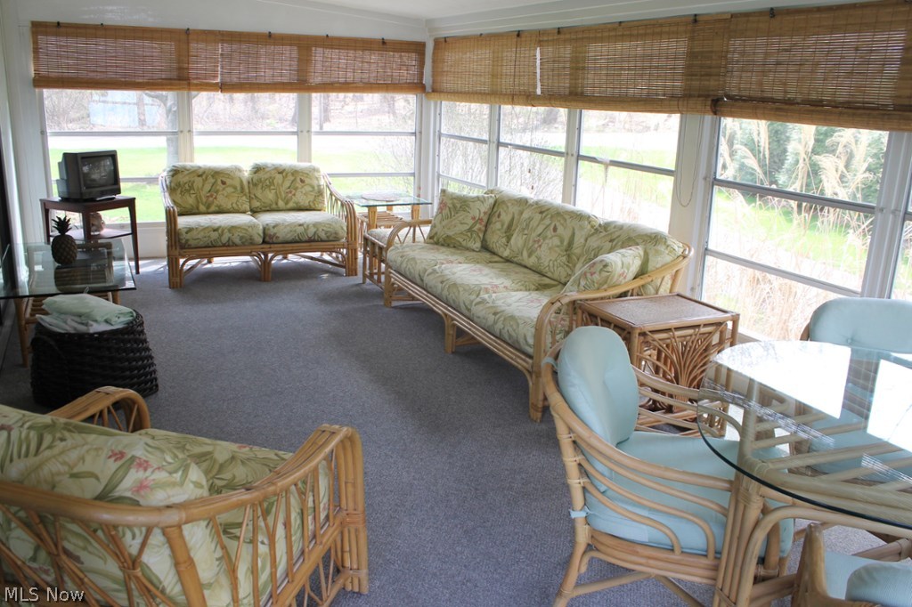 1250 Hudson Road Kent, OH 44240 - Photo 11 of 24 The HUGE sun room is great no matter what the time of year.