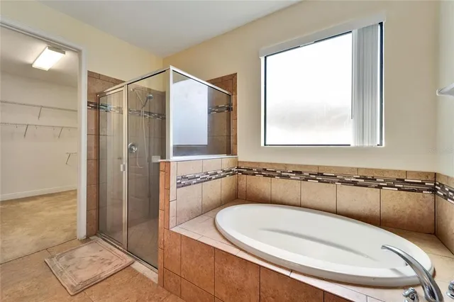 a view of yard with swimming pool and green space