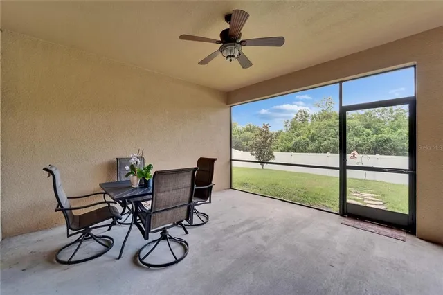 an aerial view of a house with outdoor space