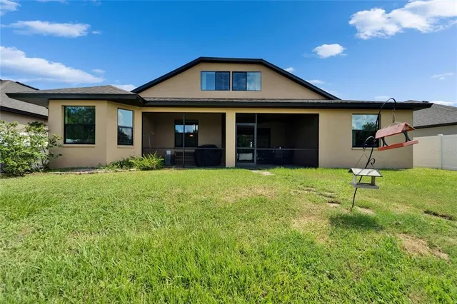 a view of a park with large trees