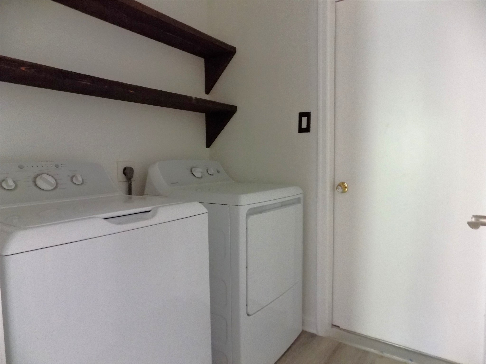 803 Wild Horse Valley Road Katy, TX 77450 - Photo 21 of 26 a utility room with dryer and washer