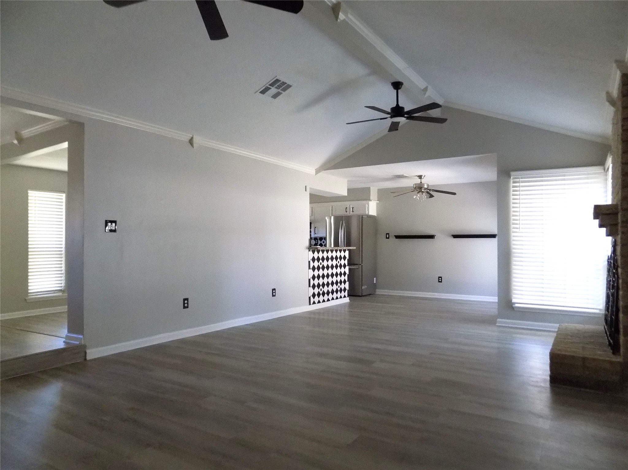 803 Wild Horse Valley Road Katy, TX 77450 - Photo 5 of 26 wooden floor in an empty room
